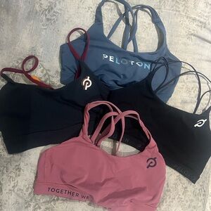 Lot of 4 medium size 8 Peloton-Lululemon energy bras Black Blue Reddish Pink